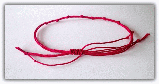 Заговор на красную нить - читаем в домашних условиях